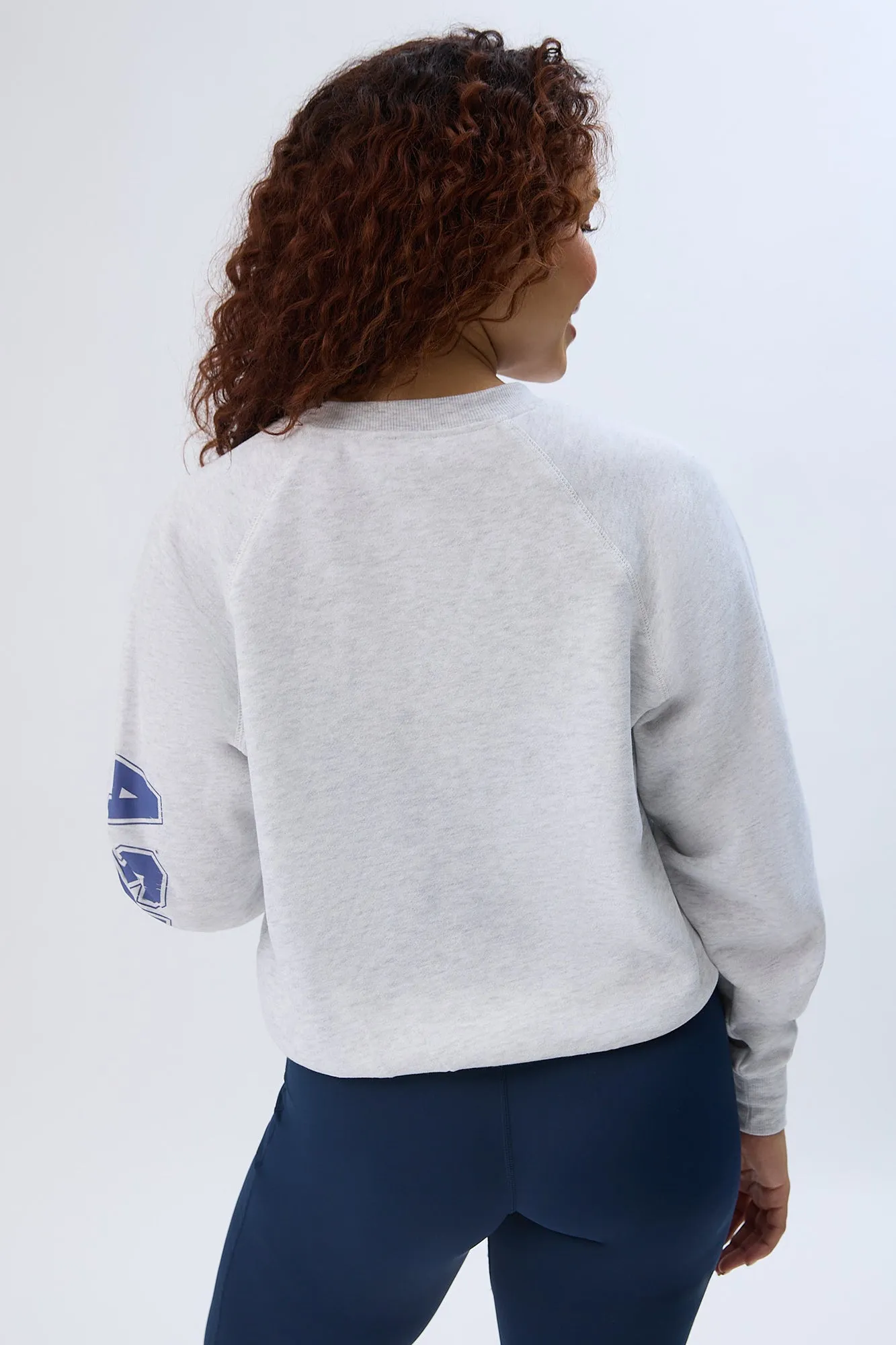 Graphic Raglan Sleeve Crew Neck Sweatshirt