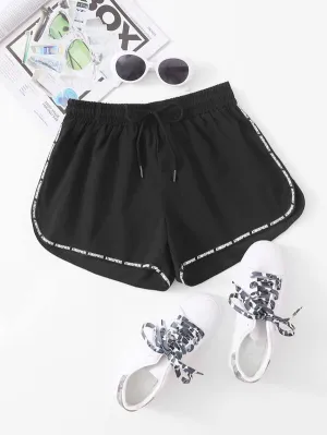 Letter Tape Drawstring Waist Dolphin Shorts
